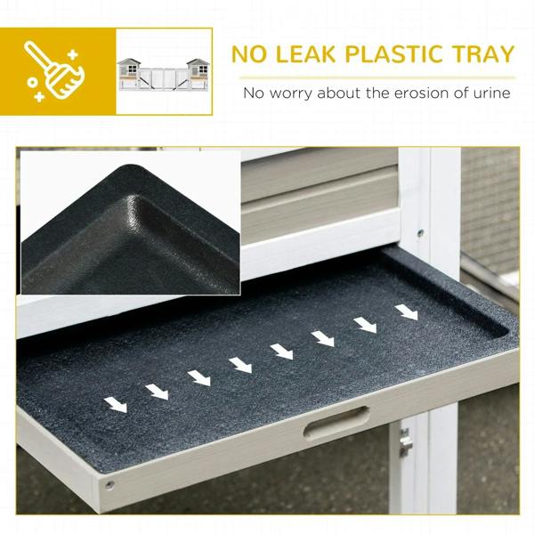 Grey hutch with black no-leak tray insert on the base, white frame and doors