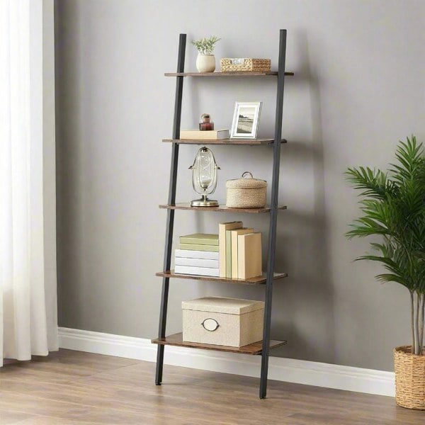"5-tier industrial ladder shelf with dark brown wood and matte black steel frame, tilted design securely mounted to wall, perfect for books and decor."

