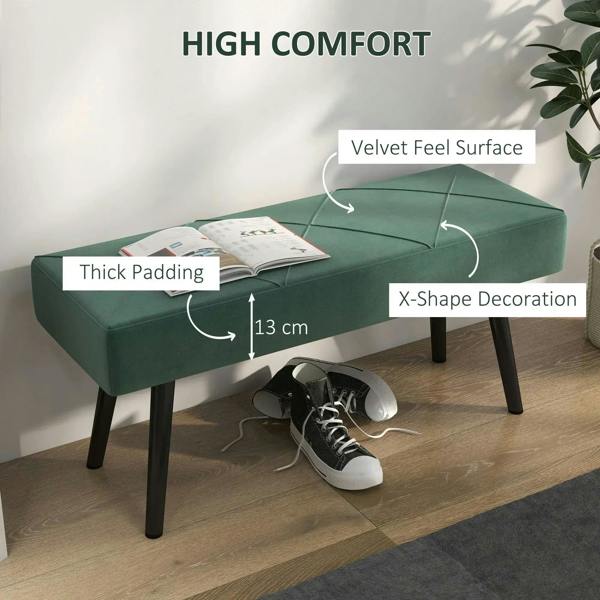 Green upholstered bench with X-shaped side decoration and thick padded seat