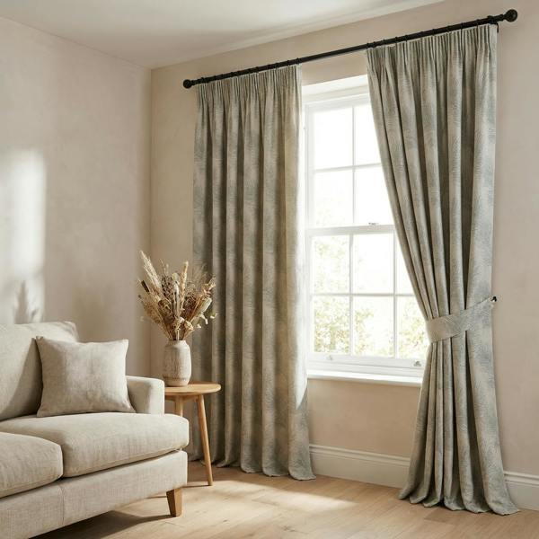 Feather made-to-measure curtains in Duck Egg, styled in a living room