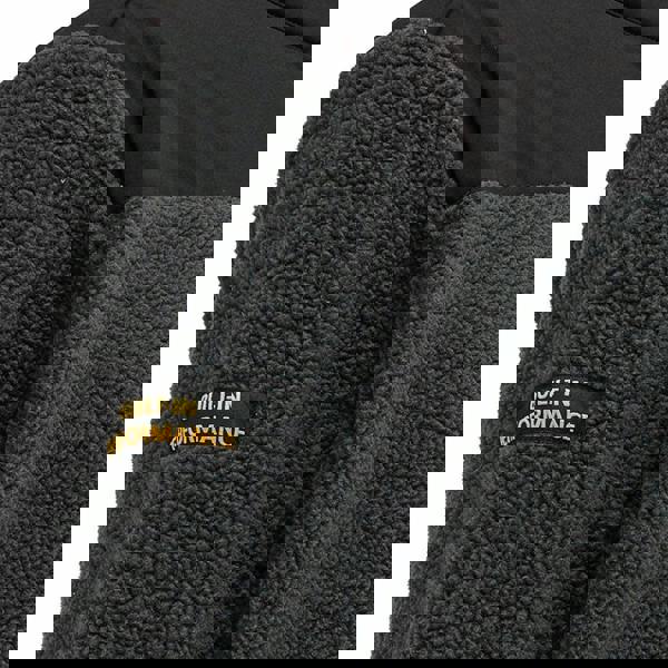 Stanley Borden Mens Zip-Up Borg Warm Work Fleece, close-up of the black fleece with a patch that reads 'Built-In Performance'.