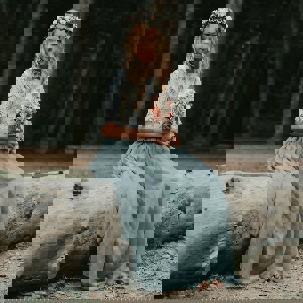 Flower girl in forest