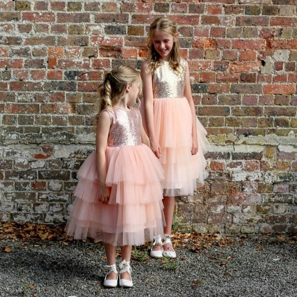 Two young girls smiling