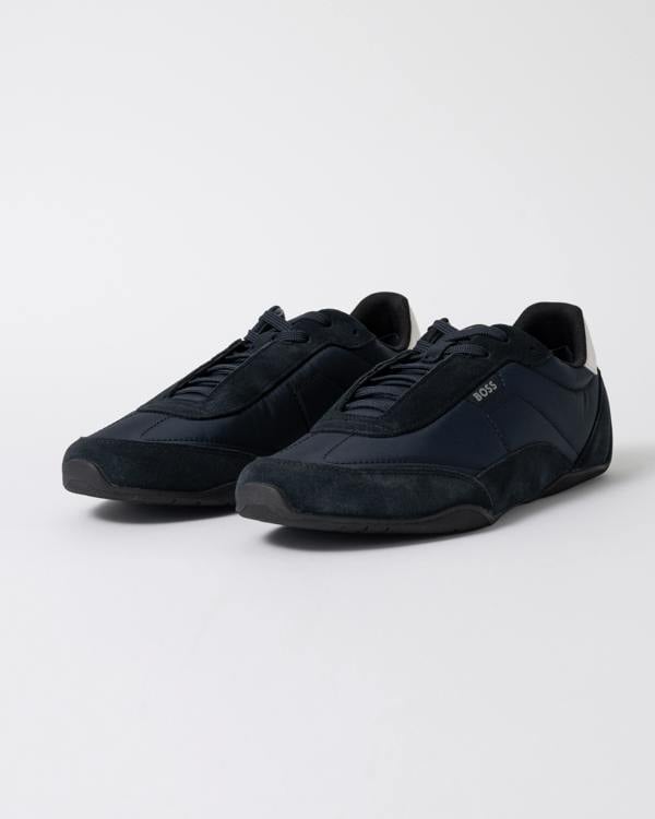 a pair of BOSS Orange Jaylen_Lowp_sdnylt Mens Trainers 50563894 in Dark Blue 401