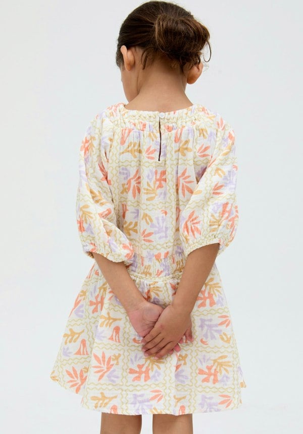 model wearing Kids Soipoi Ruched V-Neck Matisse Print Dress In Multi - image 2