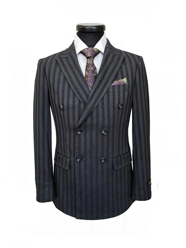 PAMONI charcoal bold stripe double-breasted suit, tailored fit with sharp lapels and classic pattern, displayed on a hanger.