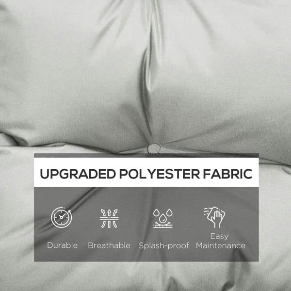 Light grey chair cushion fabric close-up with smooth, quilted surface