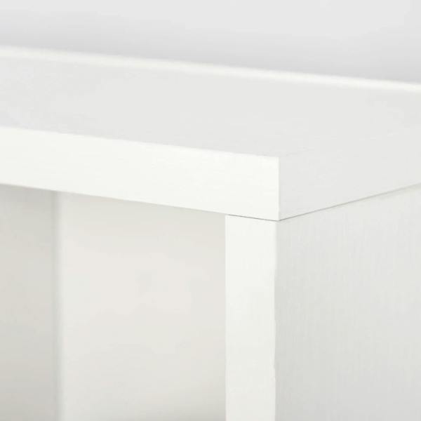 White storage cabinet corner with clean mitered edges and sturdy frame