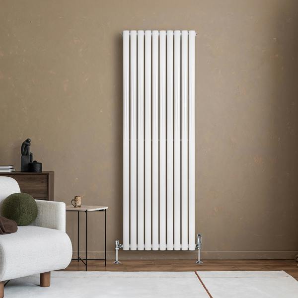 Sleek white oval single column radiator, 1800mm x 600mm, mounted on a wall, complementing a modern living room with neutral decor