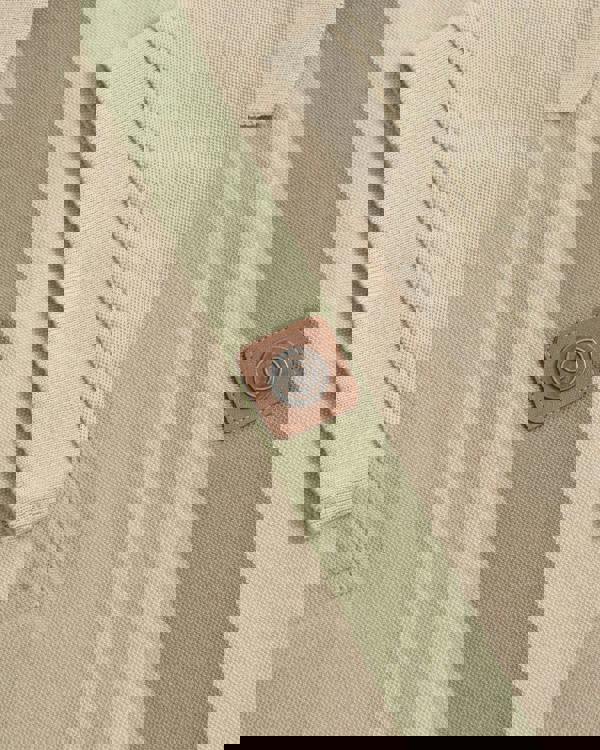 Lambretta Mens Vintage Classic Mod Ska Casual Smart Polo, close-up of beige polo shirt with green stripe and leather button detail.