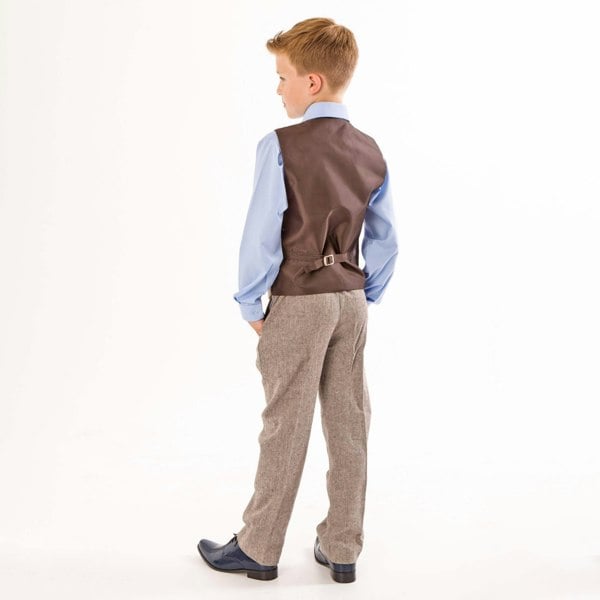 Boy wearing a tweed suit and blue shirt