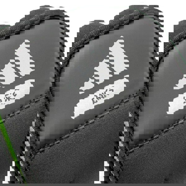 Black ankle/wrist weight with Adidas logo and '0.5KG' label on a white background