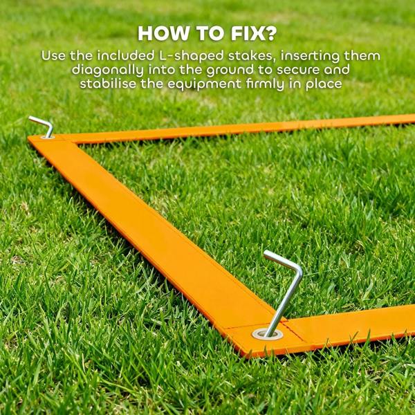 Orange slanted hurdle ramp with securing stake for dog agility training