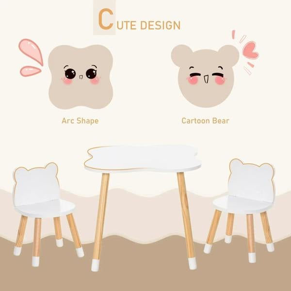 Kids table set with two white bear-shaped chairs and rounded white tabletop