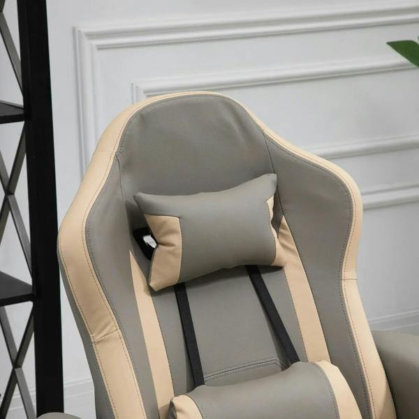 Grey recliner armchair with adjustable headrest and padded lumbar support