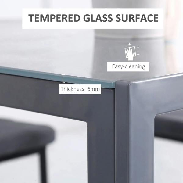 Tempered glass tabletop edge on grey square dining table with metal frame