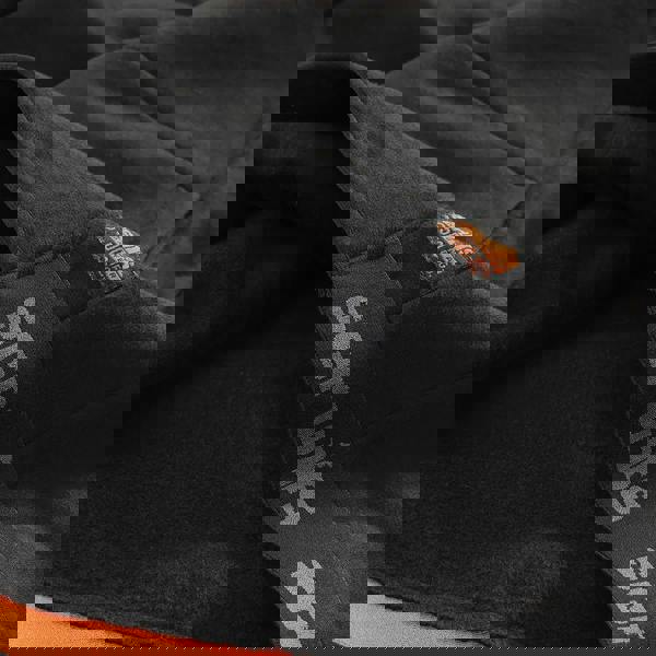 Scruffs Tech Mens Winter Warm Hooded Hoodie Sweat Shirt Jumper, close-up of black hoodie fabric showing the branded tag and logo detail.