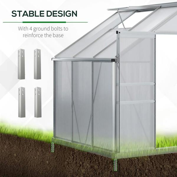 Lean-to polycarbonate greenhouse with base secured by ground bolts, clear panels, aluminum frame.
