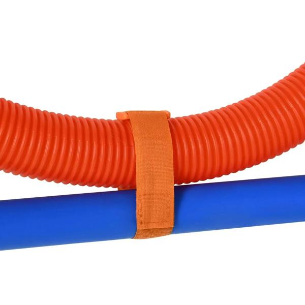 Close-up orange ribbed spring section strapped to blue agility pole