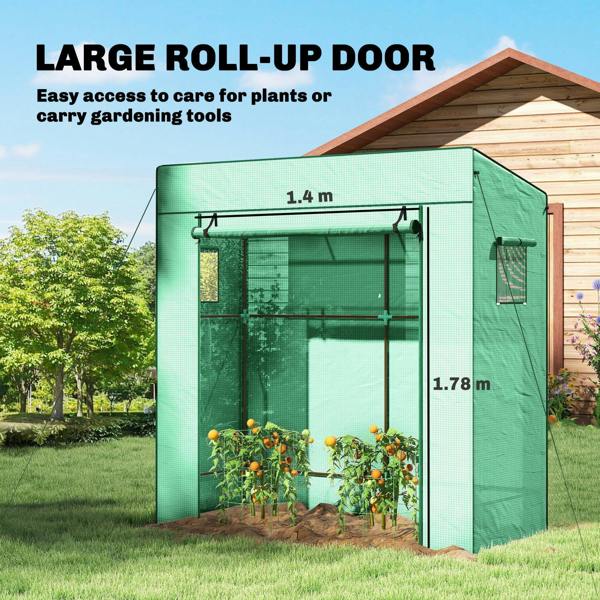 Green roll-up door greenhouse with large front opening and side access panel