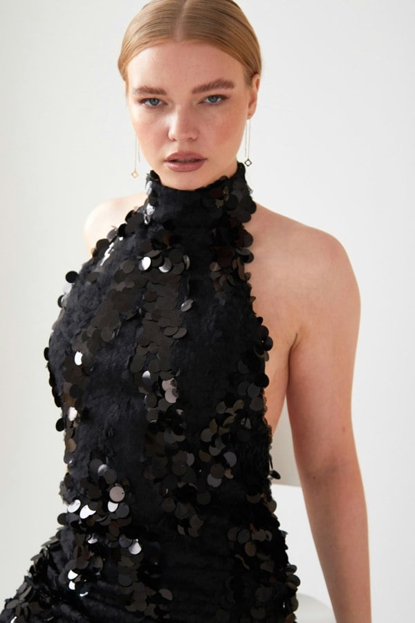 Sarvin's Black Backless Sparkly Dress.