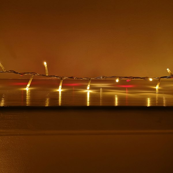Samuel Alexander 1000 LED 25m Indoor Outdoor Christmas Multi Function Mains Operated String Lights with Timer & Clear Cable in Red & Vintage Gold