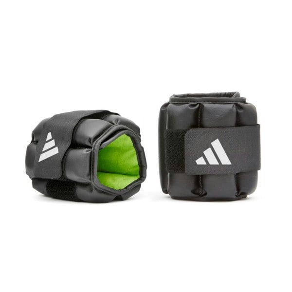Pair of black adidas Performance ankle/wrist weights 1.5kg with green interior on a white background