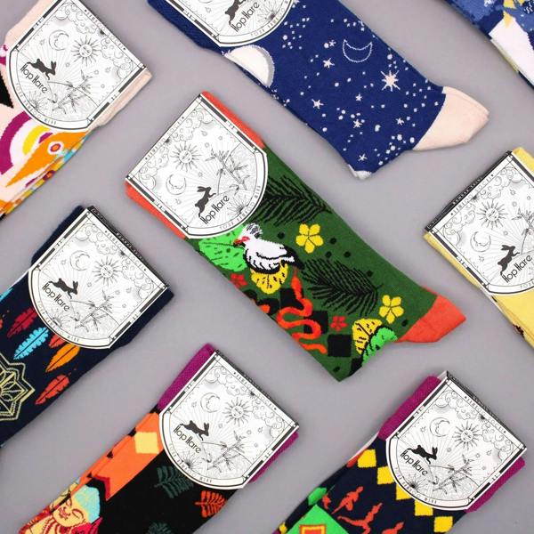 Hop Hare assorted bamboo crew socks with moon and star prints in navy, green, orange and yellow