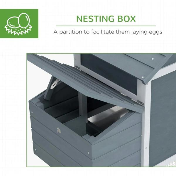 Grey nesting box inside chicken coop with partition for egg laying
