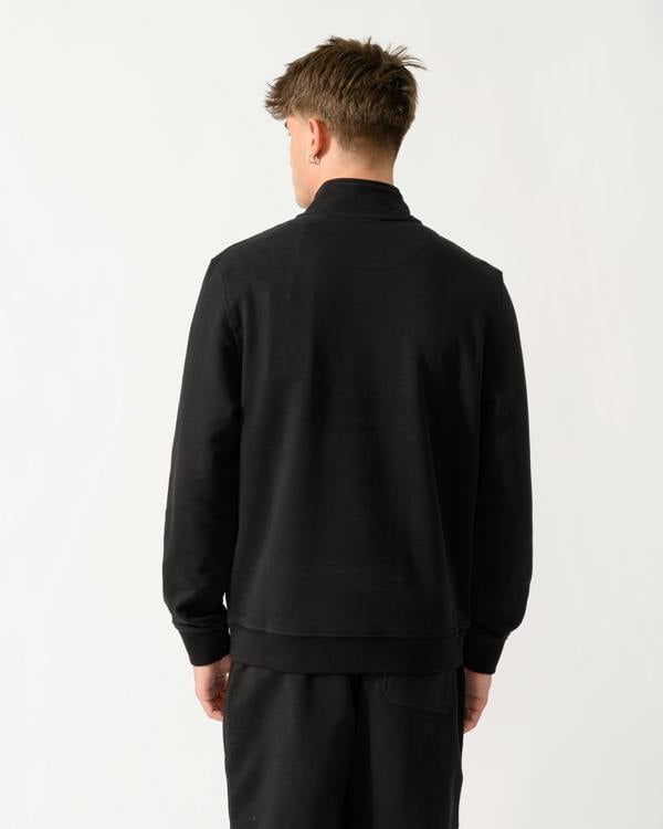 back shot of a model wearing a Belstaff Mens Logo Quarter Zip Sweatshirt in Black