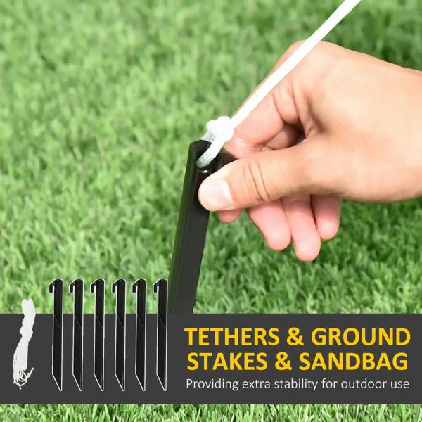 Inflatable pumpkin set with ground stakes, tethers, and sandbag for outdoor stability