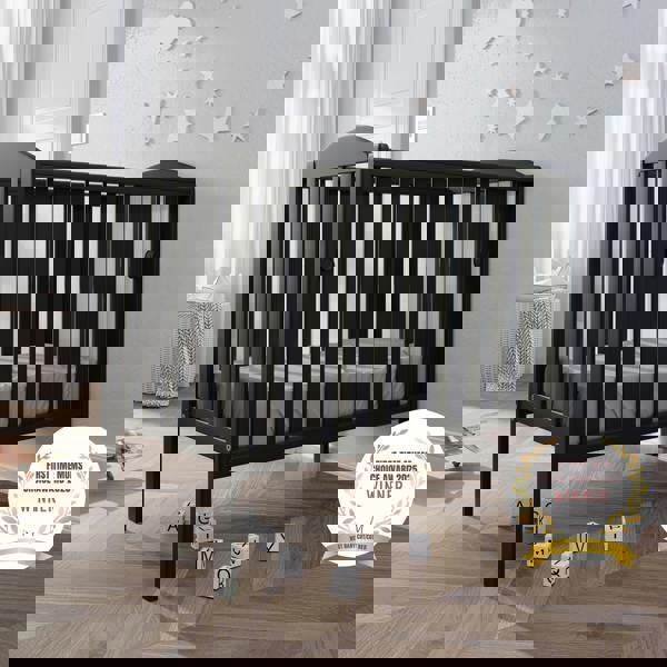 award badge - best baby cot - waffi mini space saver cot with drop side