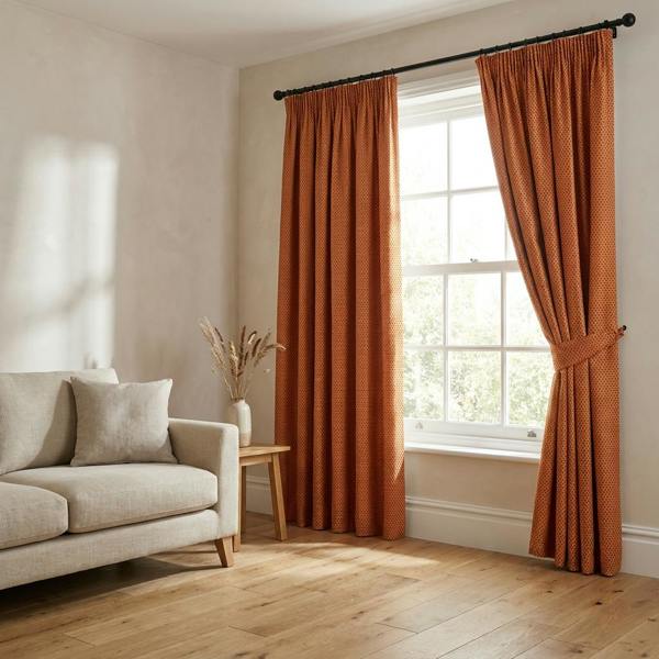 Sicily made-to-measure curtains in Terracotta, styled in a living room