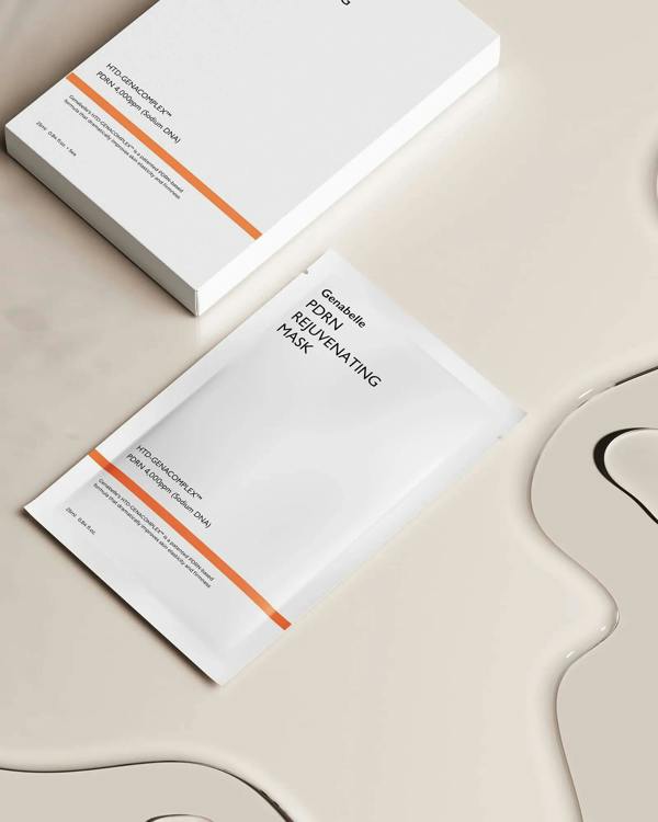 Soft, luxurious 3D embossed vegan fabric texture of Genabelle PDRN Rejuvenating Mask adhering seamlessly onto a face contour at Atelier De Glow UK.