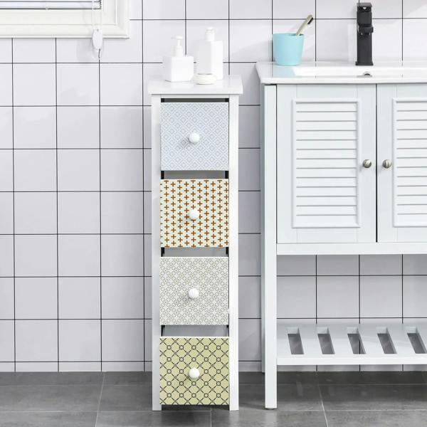 White tall 4-drawer cabinet with patterned drawer fronts and round knobs in bathroom.