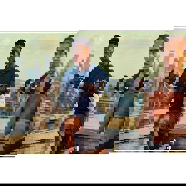 Two people exercising with dumbbells on a rooftop with a cityscape background