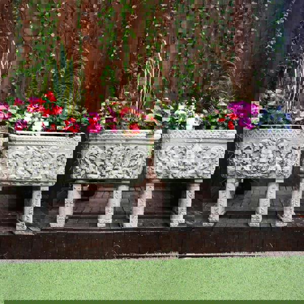 Pair of Lion design Stone Troughs on legs