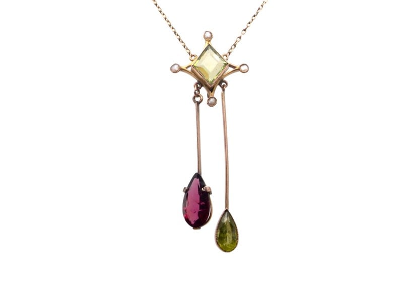 Vintage Tom An antique garnet and peridot pendant