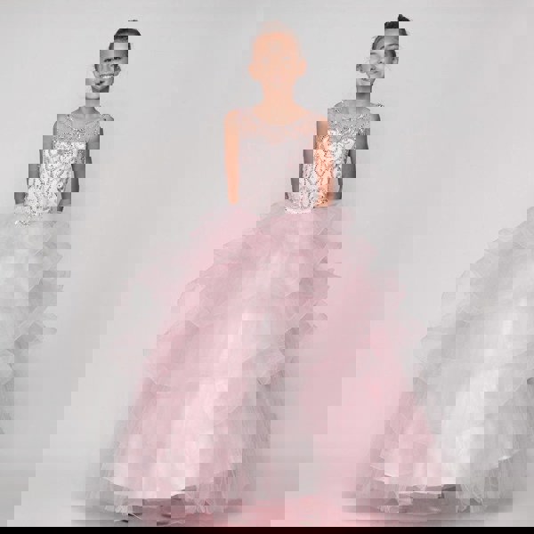 young girl wearing a Pretty pink sequin and rhinestone Dress