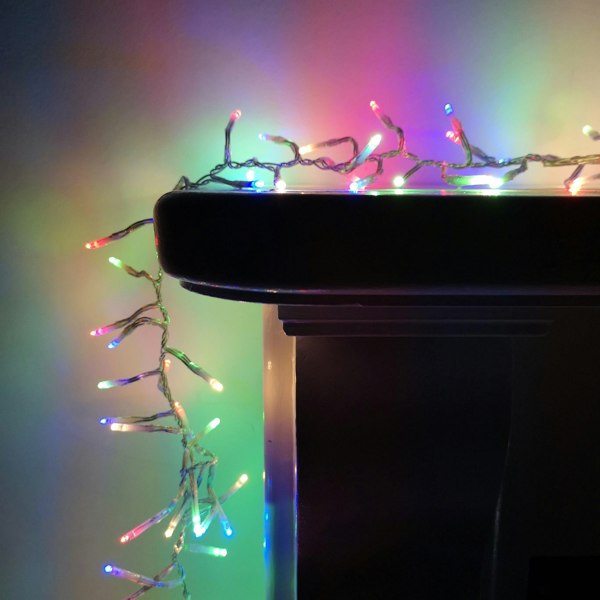 Samuel Alexander 960 LED 12m Premier Cluster Indoor Outdoor Multi Function Mains Operated Christmas Lights with Timer on Clear Cable in Multicoloured
