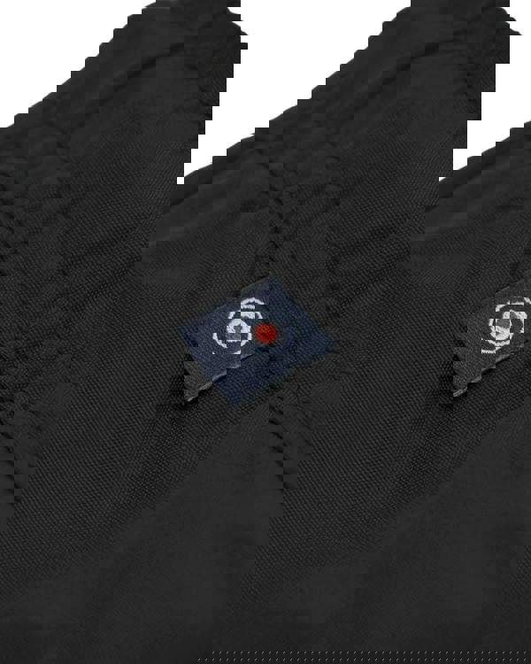 Lambretta Mens Swimming Casual Summer Shorts, close-up of black fabric with embroidered badge detail.