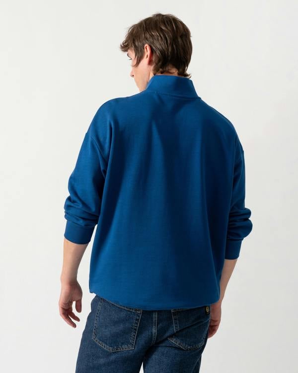 back of a HUGO Durty244 Mens 1/4 Zip Sweatshirt in Open Blue 498