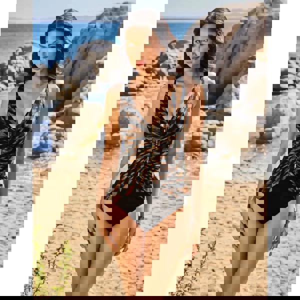 Black and gold Miraclesuit Raya Safari Charmer swimsuit with zipper front