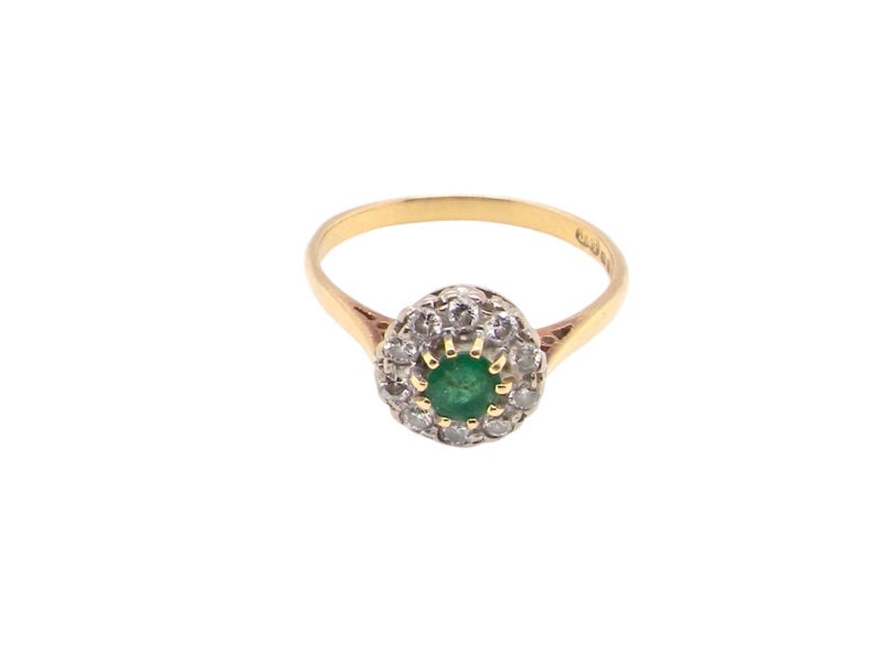 Vintage Tom A vintage Emerald and Diamond cluster ring