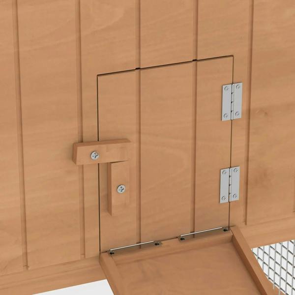 Close-up of lock hardware on wooden hutch door with metal wire mesh section