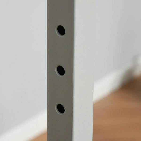 Close-up of adjustable gray height post with round hole slots for bar positioning