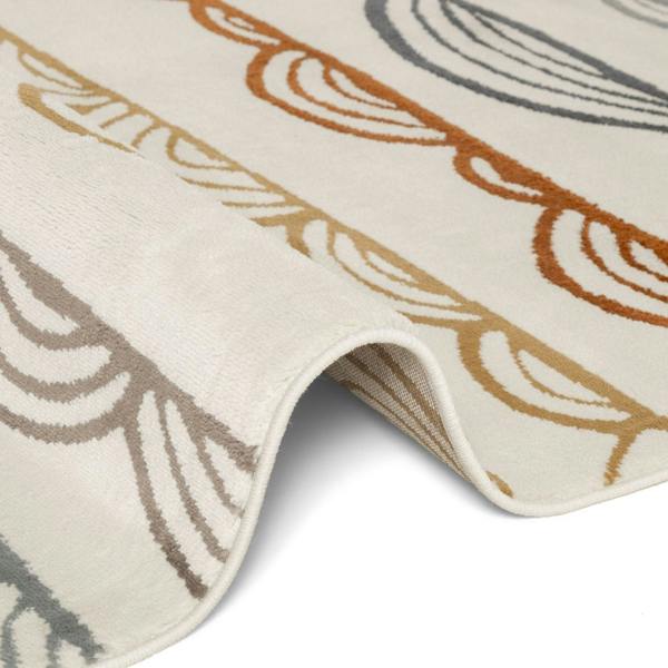 Close-up of a textured rug with leaf patterns in brown, beige, and gray on a white background.