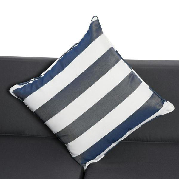 Navy and white striped throw pillow on dark outdoor sofa cushion
