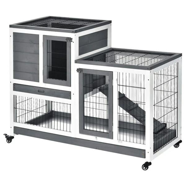 Grey wooden small animal hutch with enclosed wire run and two levels, on wheels