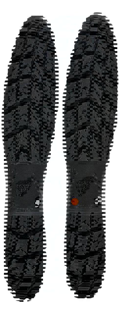 Red Wing Shoes Red Wing 3207 Petroking Mens Tall Zip Up Waterproof Safety Ankle Boots, close-up of the black rugged outsole tread pattern highlighting durability and traction.